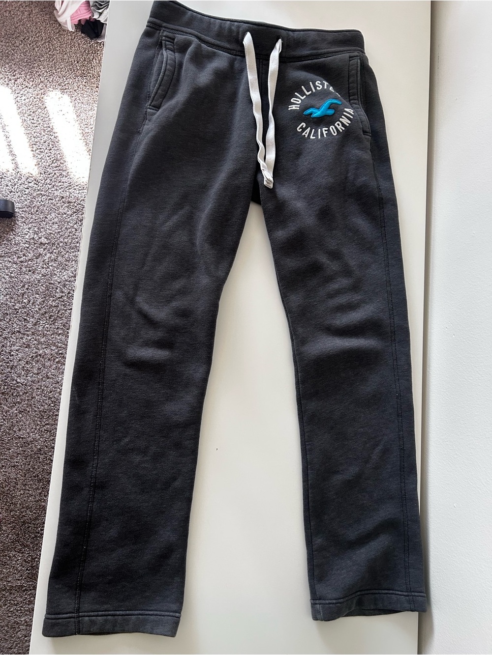 Hollister Kids Black Sweatpants with Blue Logo and White Drawstring